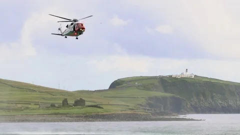 Coatguard Helicopter on exercise in Shetland Stock Footage 77646182