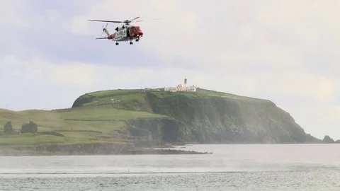 Coatguard Helicopter on exercise in Shetland Stock Footage 77646201