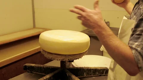 Coating Cheese With a Layer of Plastic Stock Footage 36194387