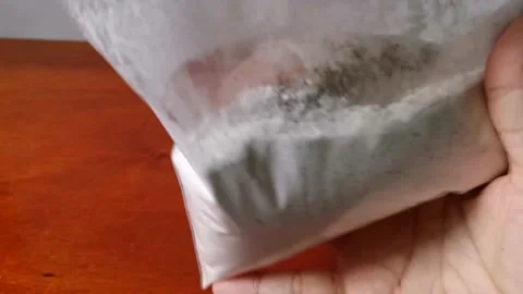 Coating Chicken Legs with Flour Mixture Stock Footage 161006066