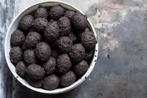 Coating Duck Eggs with Mud, Process Making Traditional Salted Egg or Telur As Stock Photos