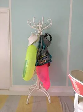 Coatrack pull of swimming gear Stock Photos