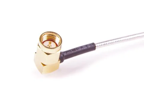 Coax cable 90 degrees angle gold plated SMA connector close up Stock Photos
