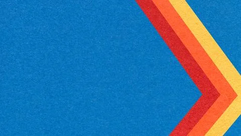 Cobalt blue paper texture background with red, orange yellow, chevron stripes Stock Photos