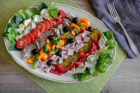 Cobb salad on the table on a platter. Stock Photos