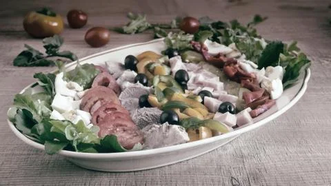Cobb salad on the table on a platter. Stock Photos