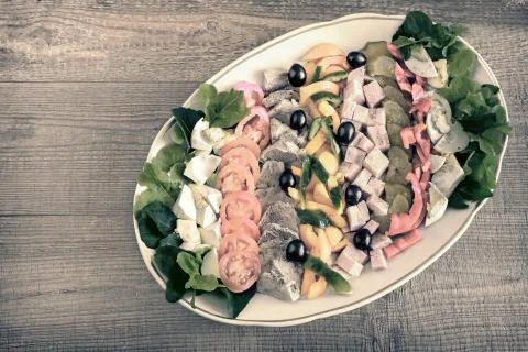Cobb salad on the table on a platter. Stock Photos