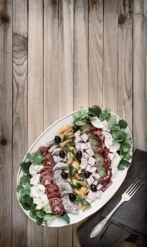 Cobb salad on the table on a platter. Stock Photos