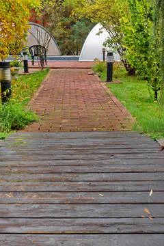 Cobble stone path in the fall garden Stock Photos
