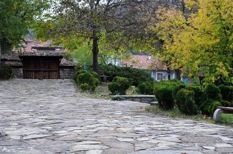 Cobbled courtyard in the fall Stock Photos