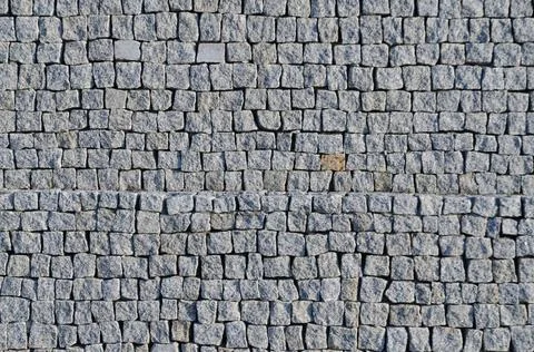 Cobbled pavement Cobbled pavement pattern made of granite cubes. Copyright... Foto stock