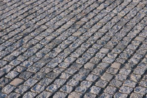 Cobbled square backgrond - cobbles pattern in Budapest, Hungary. Stock Photos