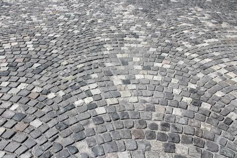 Cobbled square background - stone cobble patterns in Budapest, Hungary. Stock Photos