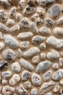 Cobbled stone wall Stock Photos