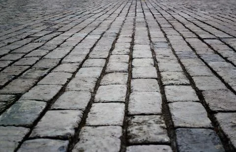 Cobbled street floor tile old brick style as background Fotos de archivo