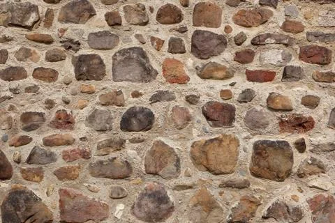 Cobbled wall background Stock Photos