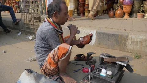 Cobbler side view Stock Footage 135478379