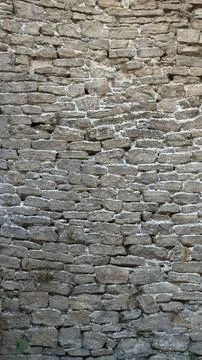 Cobblestone background of aged masonry vertical orientation Stock Photos
