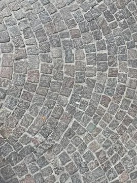 Cobblestone floor with circular pattern Foto stock