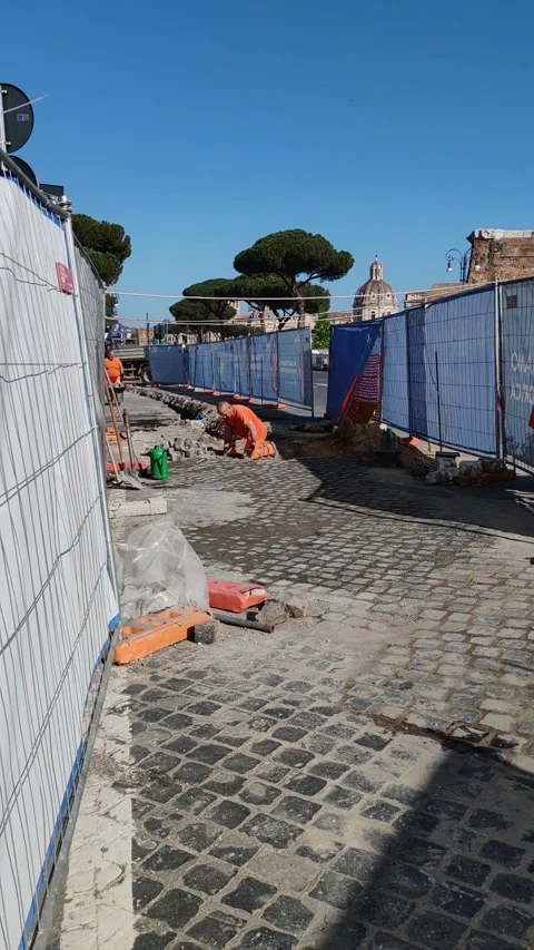 The cobblestone pavement on Via dei Fori Imperiali Stock Footage 310896414