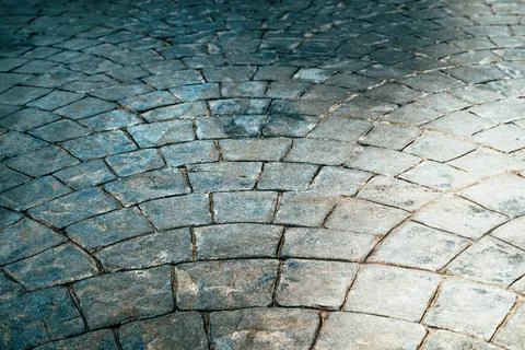 Cobblestone pavement pattern in diminishing perspective Foto stock