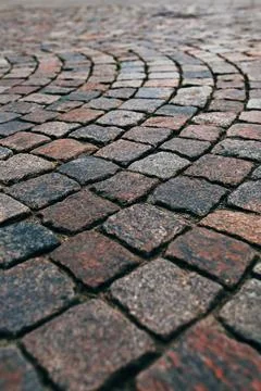 Cobblestone pavement sidewalk pattern, low angle view Stock Photos