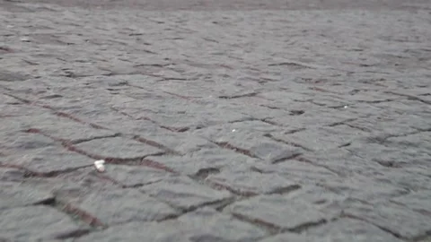 Cobblestone pavement texture, ground level closeup shot Vidéo 310300930