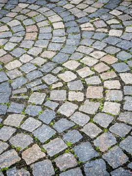 Cobblestone pavers arranged in arch pattern Stock Photos