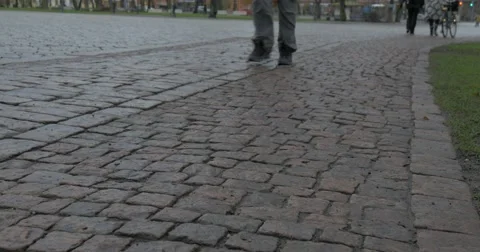 Cobblestone sidewalk made of cubic stones Stock Footage 43650806