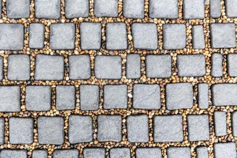 Cobblestone stone block footpath texture pattern background Stock Photos