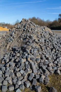 Cobblestone stored at a construction site Stock Photos