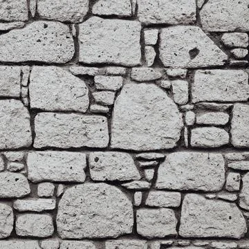 Cobblestone wall. Medieval Fa ade. Ancient Fence. Castle-stone Background. Stock-Fotos