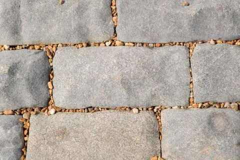 Cobblestones with peeble background texture Stock Photos