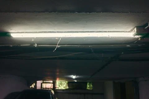 Cobweb lighting in the basement Stock Photos