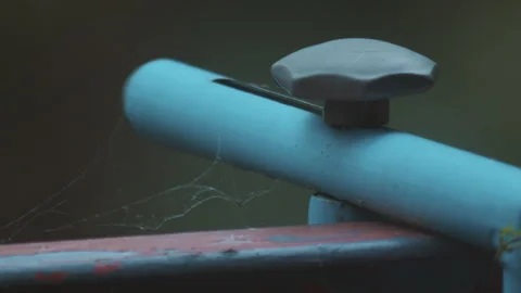 Cobweb in the wind on a handrail Stock Footage 164895674