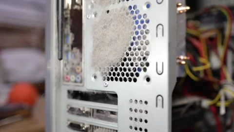 Cobwebs and dust sway in the wind in a computer case against the backdrop Stock Footage 262674367