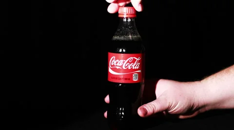Coca-Cola Bottle Being Open Up  Stock Footage 35530778