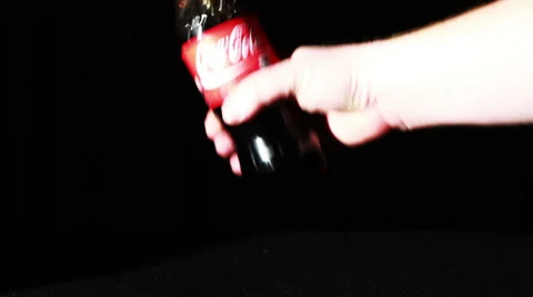 Coca-Cola Bottle Being Picked Up The Slammed  Stock Footage 35530600