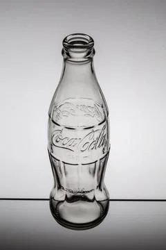 Coca-Cola drink, old two-glass bottle  isolated on white background Stock Photos