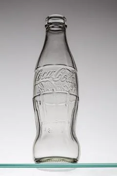 Coca-Cola drink, old two-glass bottle  isolated on white background Stock Photos