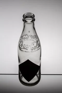 Coca-Cola drink, old two-glass bottle  isolated on white background Stock Photos