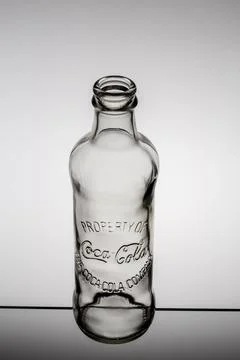 Coca-Cola drink, old two-glass bottle  isolated on white background Stock Photos