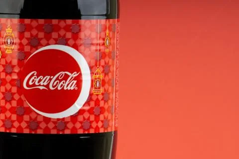 Coca Cola Lantern edition bottle drink over a red  background 写真素材