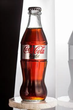 Coca cola, old version of the bottle, glass  isolated background Stock Photos