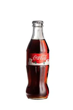 Coca cola, old version glass bottle on an isolated background Stock Photos