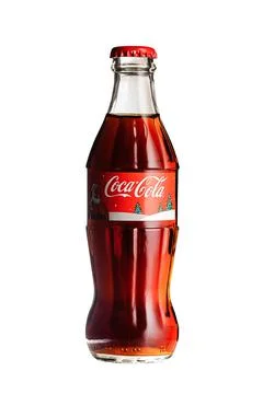 Coca cola, old version glass bottle on an isolated background Stock Photos