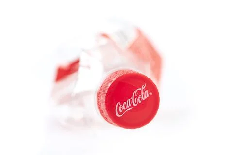 Coca-Cola plastic bottle showing environmental pollution problem Stock Photos