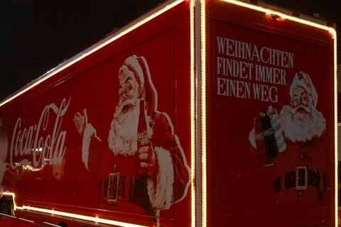 Coca-Cola van decorated with winter pattern and festive lighting, Austria Stock Photos