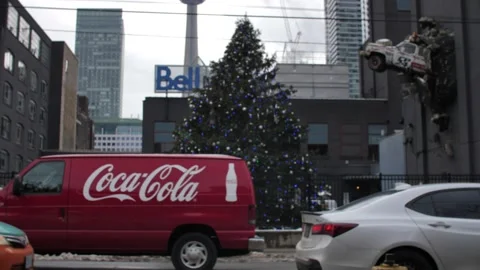 Coca Cola van drives in Toronto with Christmas Tree, Car Crash and CN Tower Видео 149220620