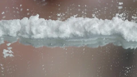 Cocaine Being Snorted Off a Mirror with a Straw Stock Footage 90062262